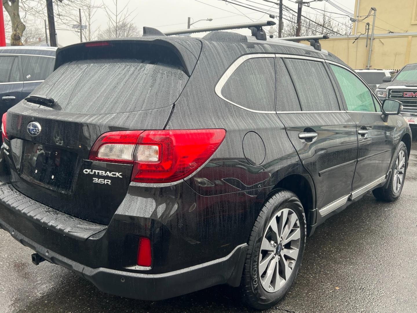 2017 BLACK /Brown Leather Subaru Outback 2.5i Touring (4S4BSETCXH3) with an 2.5L H4 DOHC 16V engine, 6A transmission, located at 1018 Brunswick Ave, Trenton, NJ, 08638, (609) 989-0900, 40.240086, -74.748085 - Photo#4